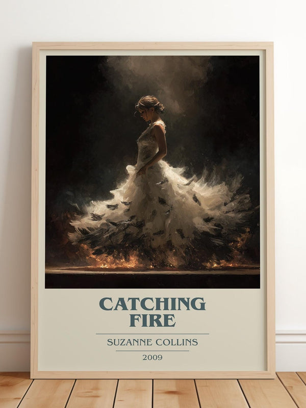 Catching Fire book cover print in frame leaning in hallway – poetry wall art