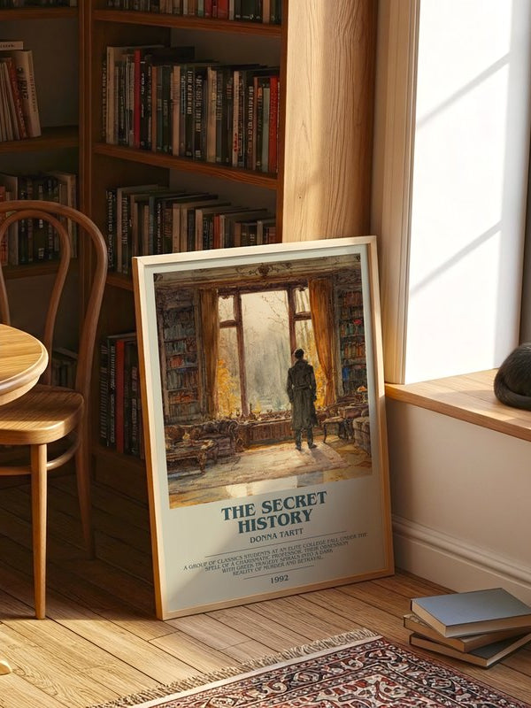 The Secret History poster, framed in a room