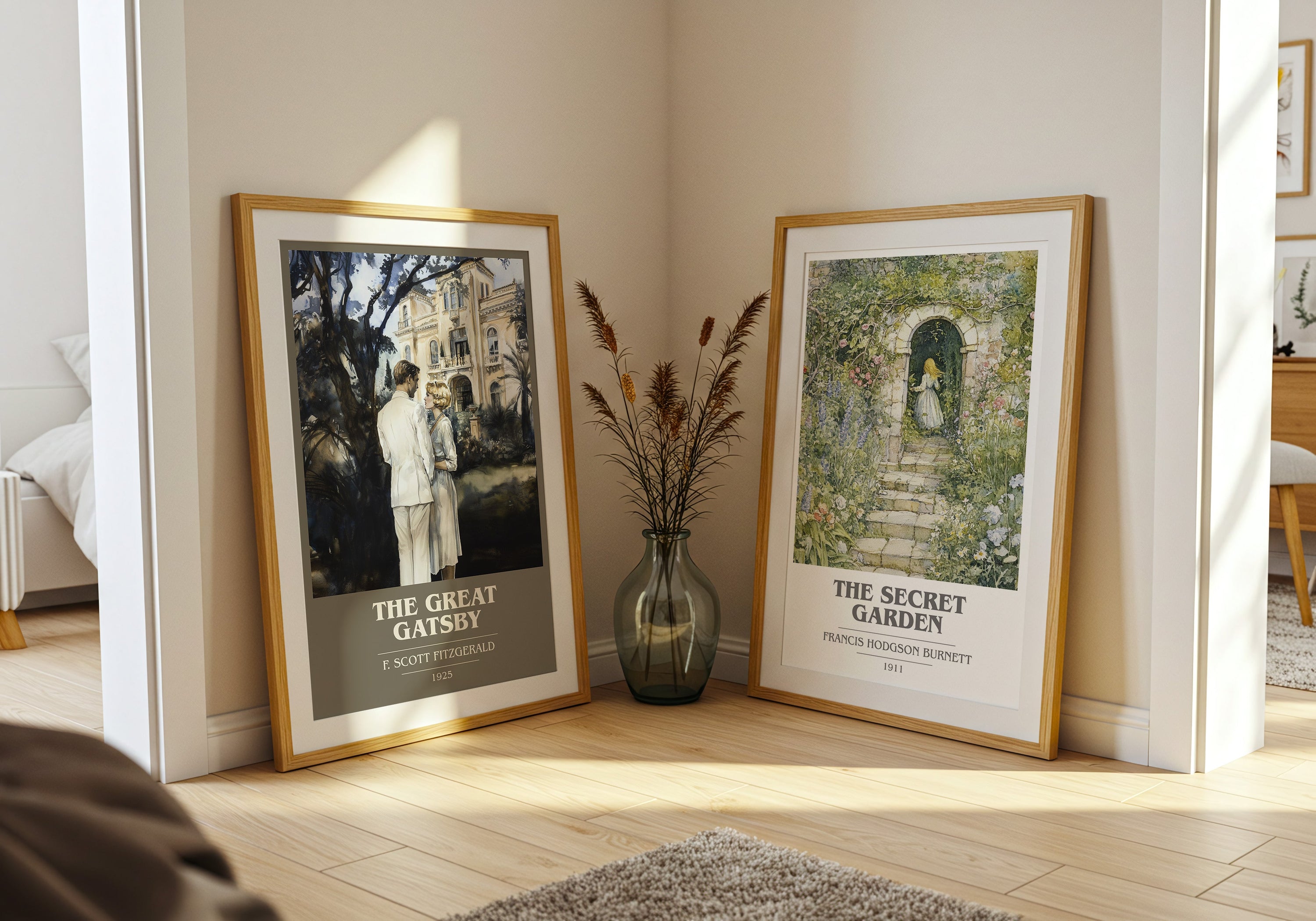 Framed vintage book cover posters of The Great Gatsby and The Secret Garden leaning by wall with vase and dried flowers