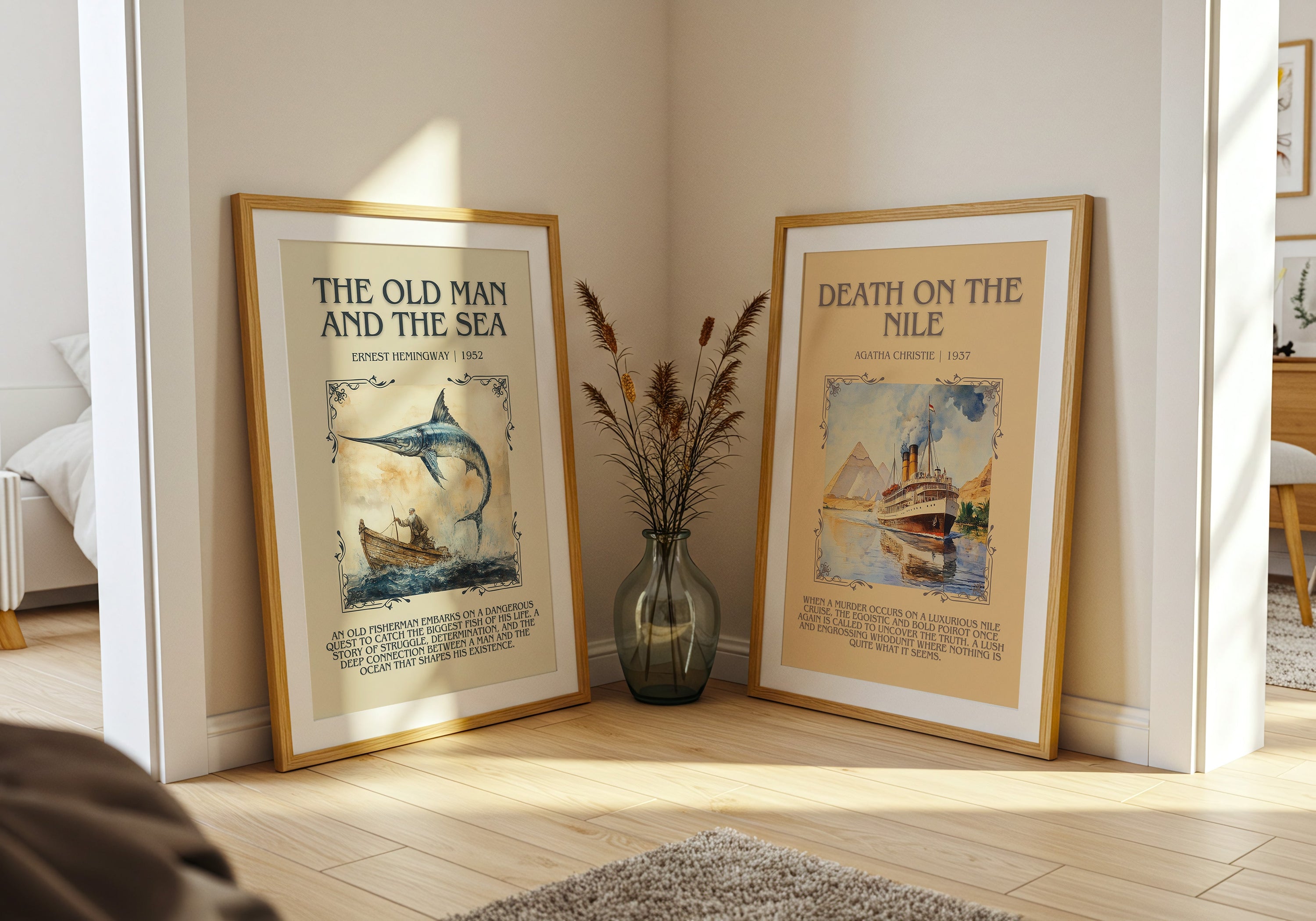 Two framed classic book posters leaning against a wall with a vase of dried plants between them