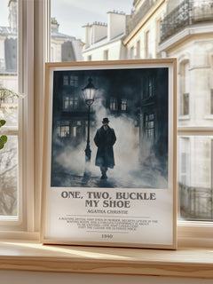 One, Two, Buckle My Shoe Bookish Wall Art by Agatha Christie – framed print by a bright window