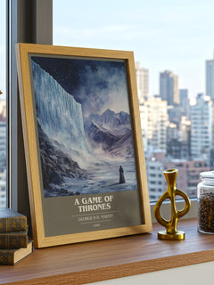 A Game Of Thrones Book Cover Poster by George R.R. Martin – framed print on a city-view windowsill