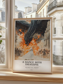 A Dance With Dragons Book Cover Poster by George R.R. Martin – framed print by a bright window