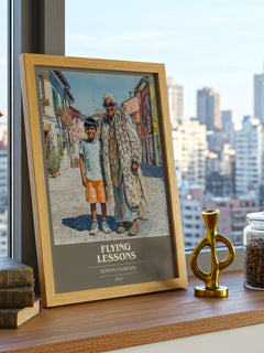 Flying Lessons Book Cover Poster by Soman Chainani – framed print on a city-view windowsill