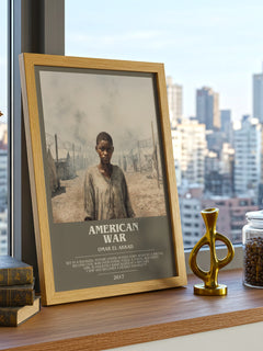 American War Bookish Wall Art by Omar El Akkad – framed print on a city-view windowsill