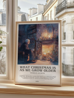 What christmas is as we grow older Bookish Wall Art by Charles Dickens – framed print by a bright window