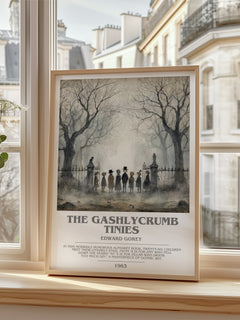 The Gashlycrumb Tinies bookish print in frame leaning in hallway – childrens wall art
