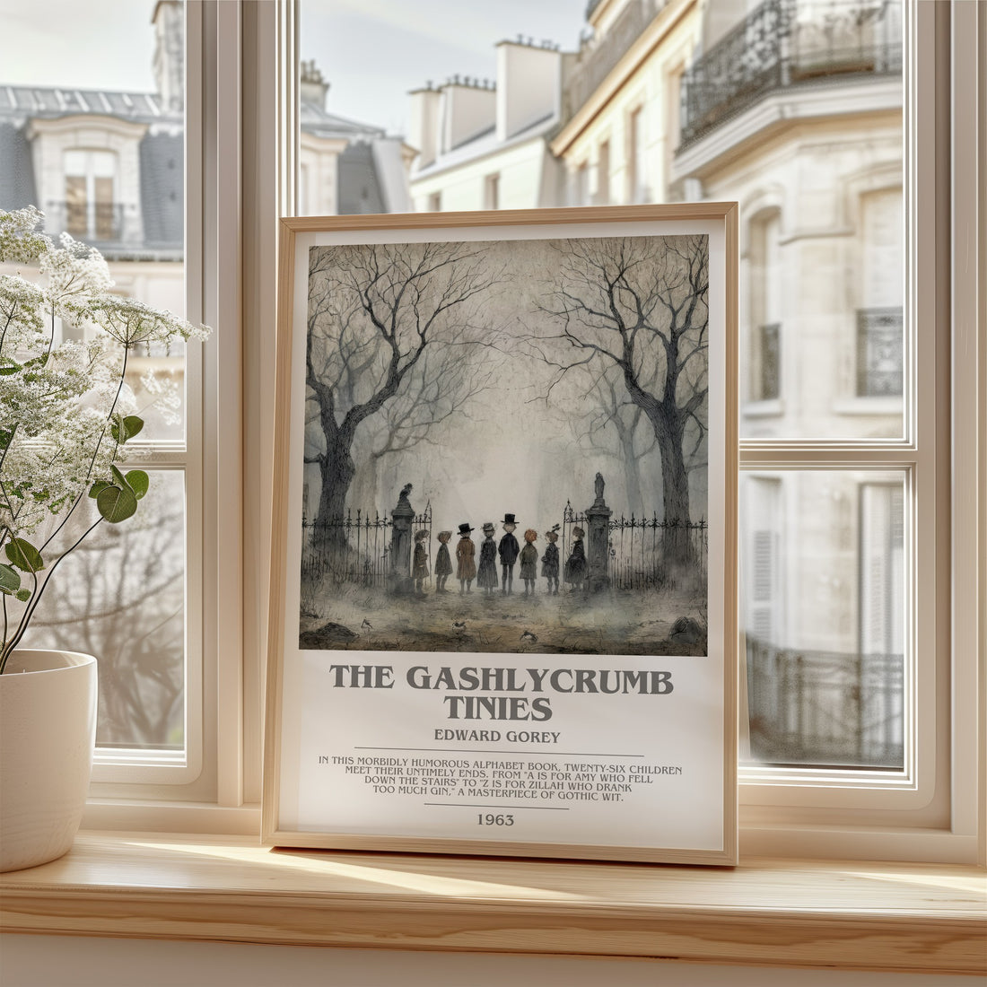 The Gashlycrumb Tinies bookish print in frame leaning in hallway – childrens wall art