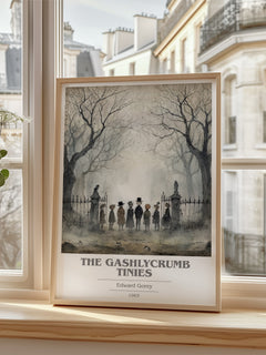 The Gashlycrumb Tinies book cover print in frame leaning in hallway – childrens wall art
