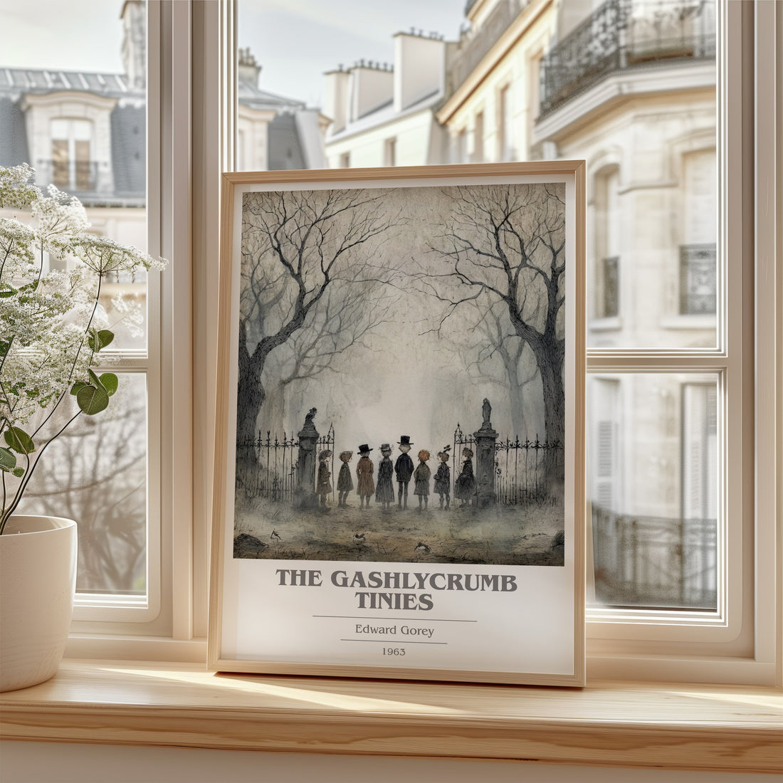 The Gashlycrumb Tinies book cover print in frame leaning in hallway – childrens wall art