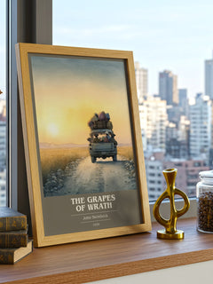 The Grapes of Wrath Book Cover Poster by John Steinbeck – framed print on a city-view windowsill