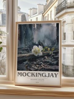 Mockingjay Book Cover Poster by Suzanne Collins – framed print by a bright window