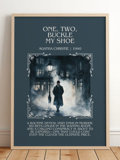 One, Two, Buckle My Shoe Minimalist Book Poster by Agatha Christie – framed print leaning on a wooden floor