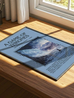 A Game Of Thrones Minimalist Book Poster by George R.R. Martin – print on a sunlit desk