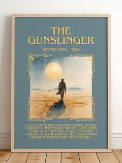 The Gunslinger Minimalist Book Poster by Stephen King – framed print leaning on a wooden floor