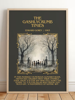 The Gashlycrumb Tinies Minimalist Book Poster by Edward Gorey – framed print leaning on a wooden floor