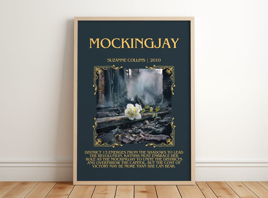 Mockingjay Minimalist Book Poster by Suzanne Collins – framed print leaning on a wooden floor