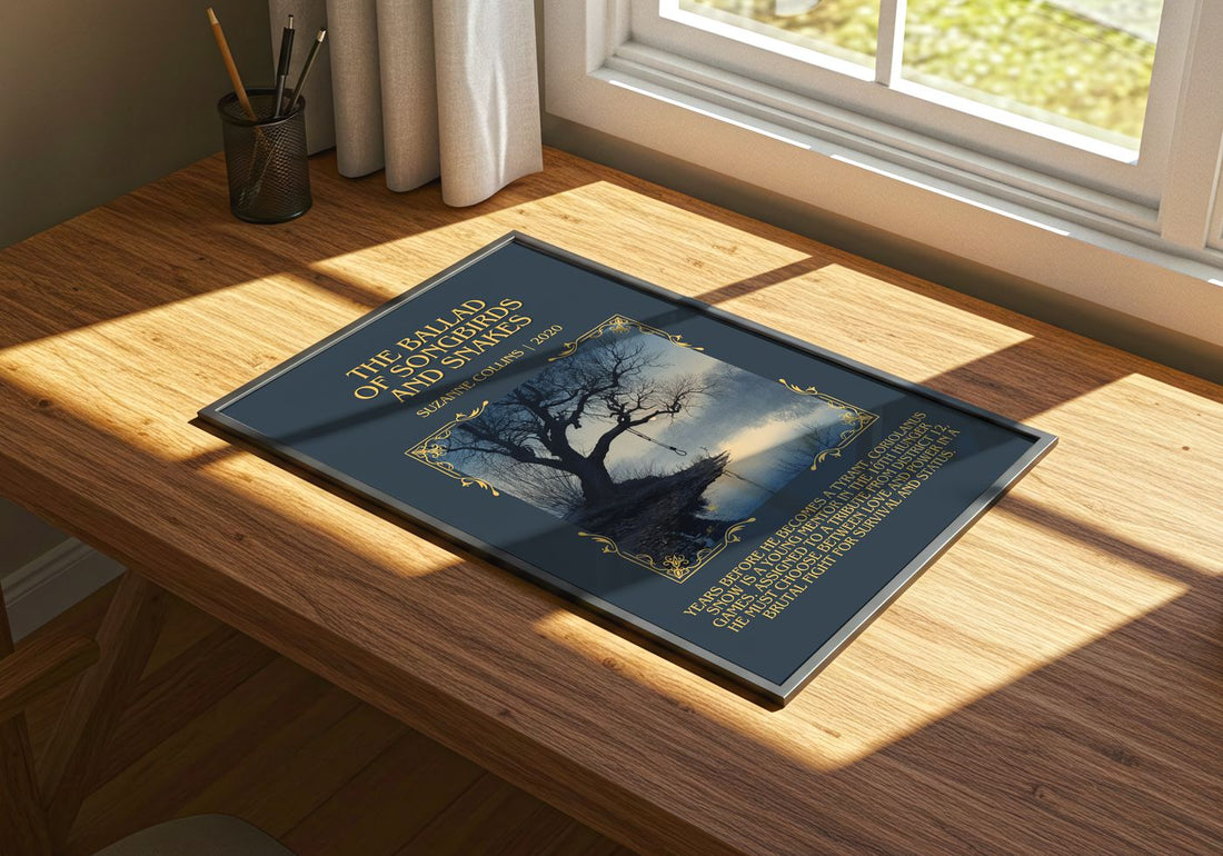 Ballad Of Songbirds And Snakes Minimalist Book Poster by S. Collins – print on a sunlit desk
