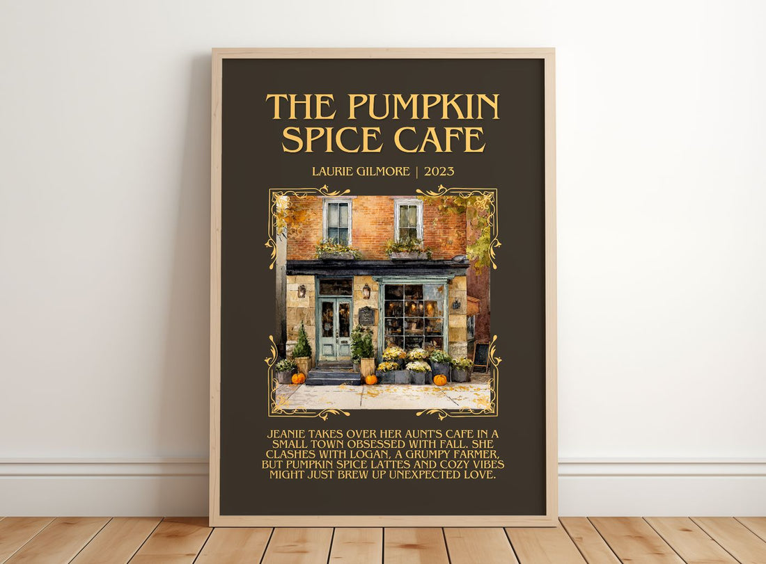 The Pumpkin Spice Café Minimalist Book Poster by Laurie Gilmore – framed print leaning on a wooden floor