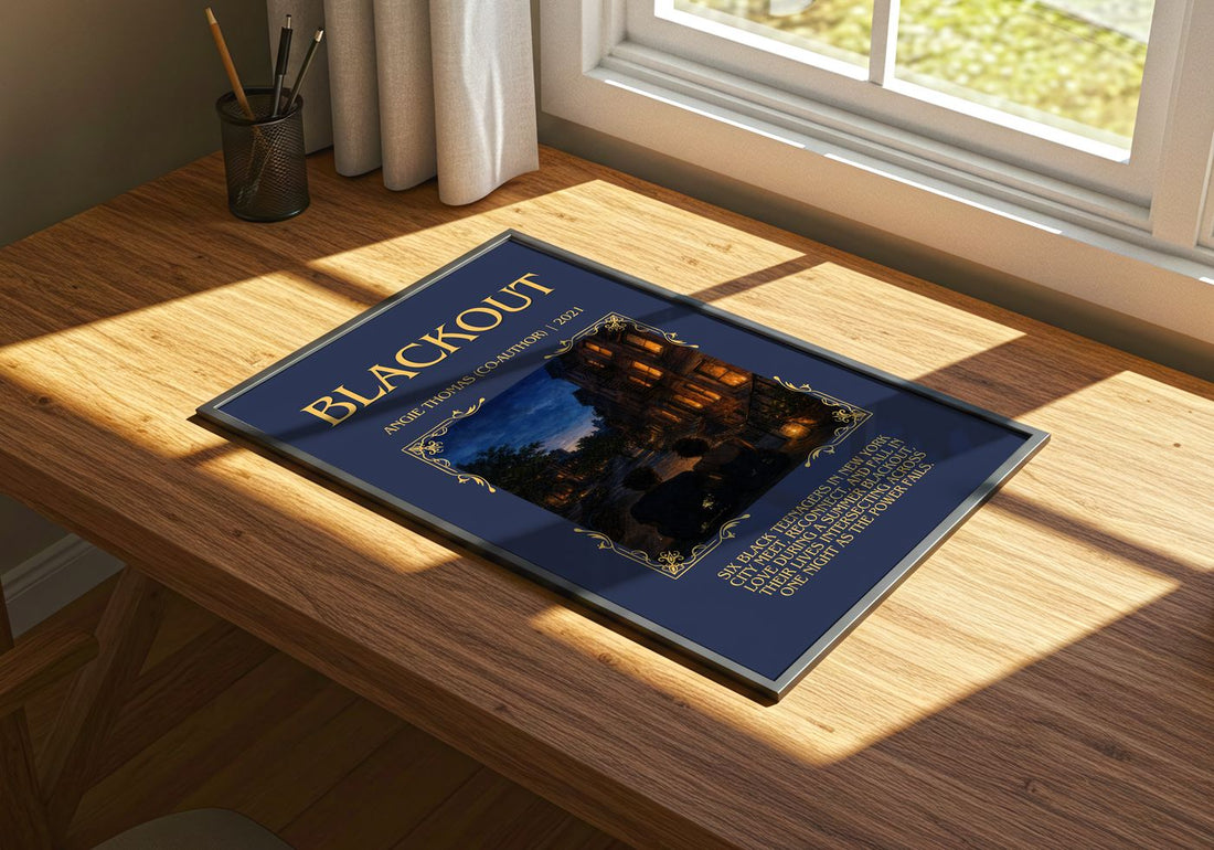 Blackout Minimalist Book Poster by Angie Thomas (Co-Author) – print on a sunlit desk