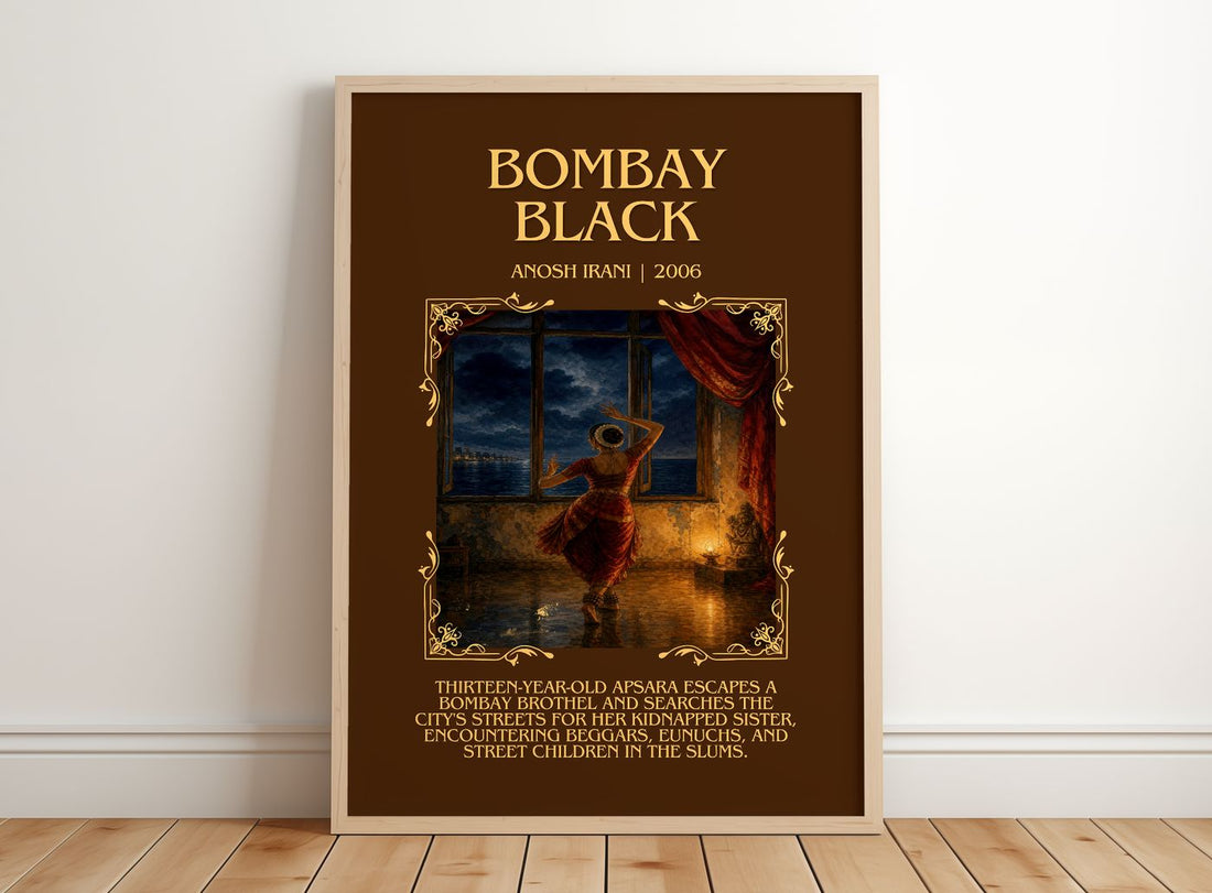 Bombay Black Minimalist Book Poster by Anosh Irani – framed print leaning on a wooden floor