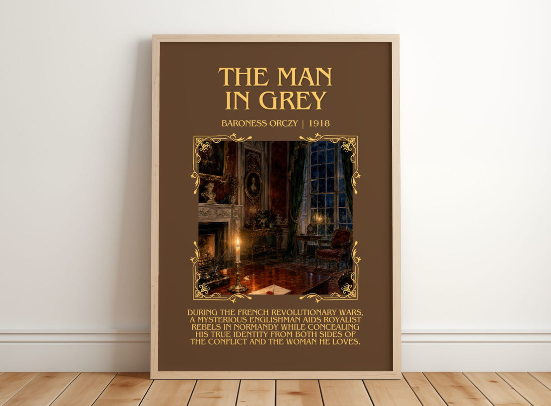 The Man In Grey Minimalist Book Poster by Baroness Orczy – framed print leaning on a wooden floor