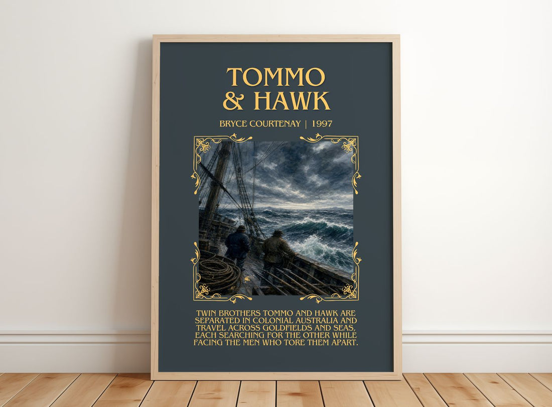 Tommo & Hawk Minimalist Book Poster by Bryce Courtenay – framed print leaning on a wooden floor