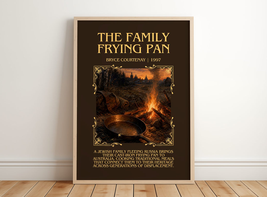 The Family Frying Pan Minimalist Book Poster by Bryce Courtenay – framed print leaning on a wooden floor