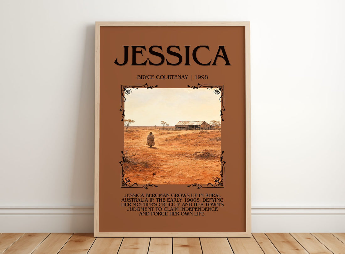 Jessica Minimalist Book Poster by Bryce Courtenay – framed print leaning on a wooden floor