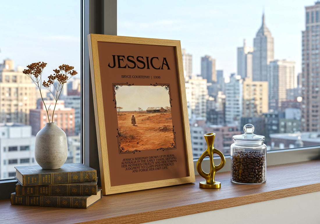 Jessica Minimalist Book Poster by Bryce Courtenay – framed print on a city-view windowsill