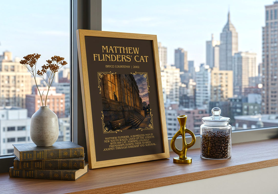 Matthew Flinders' Cat Minimalist Book Poster by Bryce Courtenay – framed print on a city-view windowsill