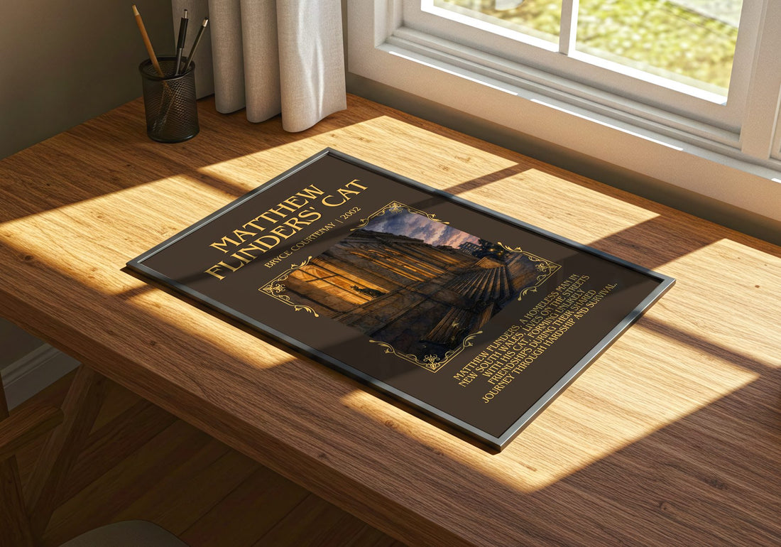Matthew Flinders' Cat Minimalist Book Poster by Bryce Courtenay – print on a sunlit desk