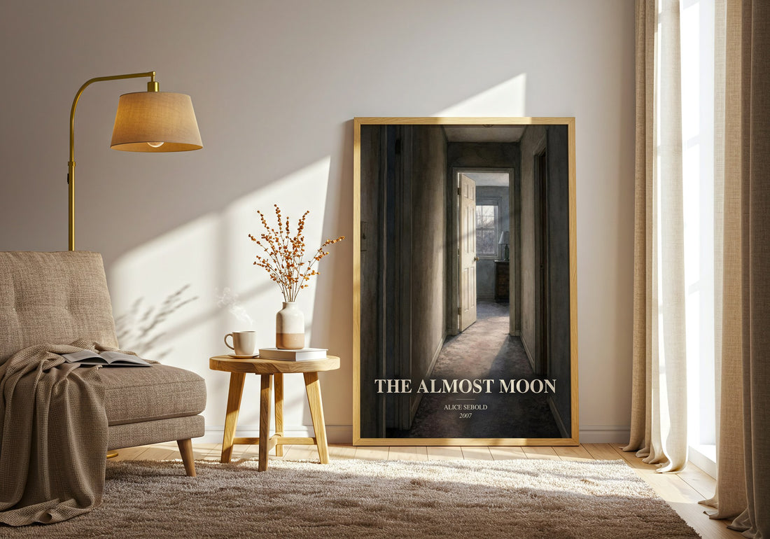 The Almost Moon watercolour print in frame leaning in hallway – literary fiction wall art (mockup)