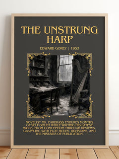 The Unstrung Harp Minimalist Book Poster by Edward Gorey – framed print leaning on a wooden floor