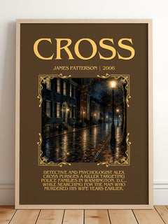 Cross Minimalist Book Poster by James Patterson – framed print leaning on a wooden floor