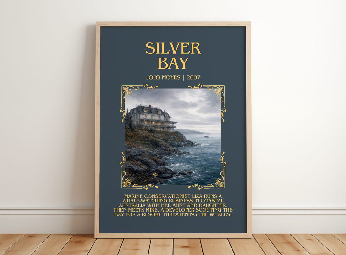 Silver Bay Minimalist Book Poster by Jojo Moyes – framed print leaning on a wooden floor
