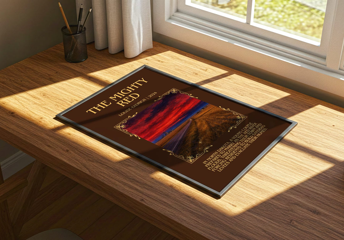 The Mighty Red Minimalist Book Poster by Louise Erdrich – print on a sunlit desk