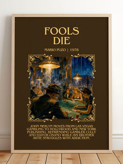 Fools Die Minimalist Book Poster by Mario Puzo – framed print leaning on a wooden floor