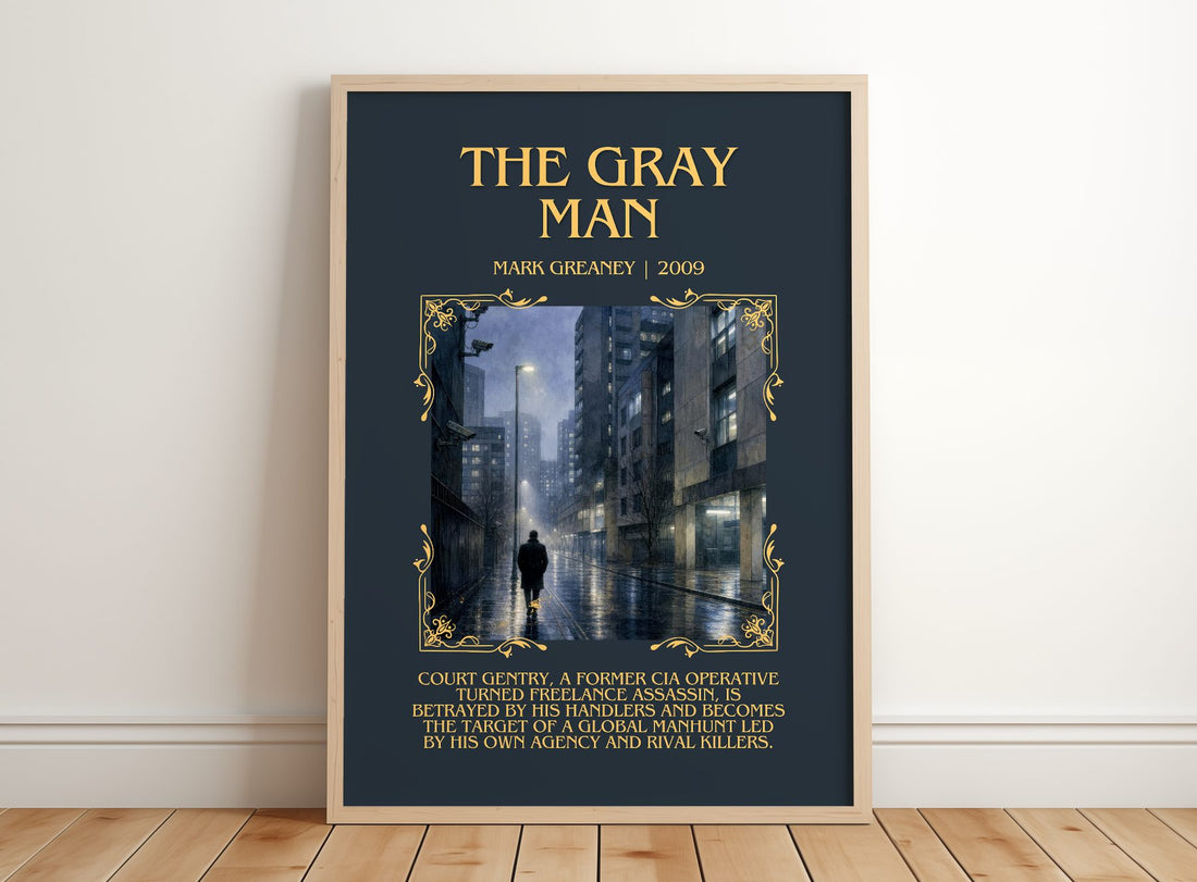 The Gray Man Minimalist Book Poster by Mark Greaney – framed print leaning on a wooden floor
