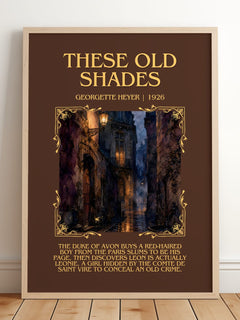 These Old Shades Minimalist Book Poster by Georgette Heyer – framed print leaning on a wooden floor