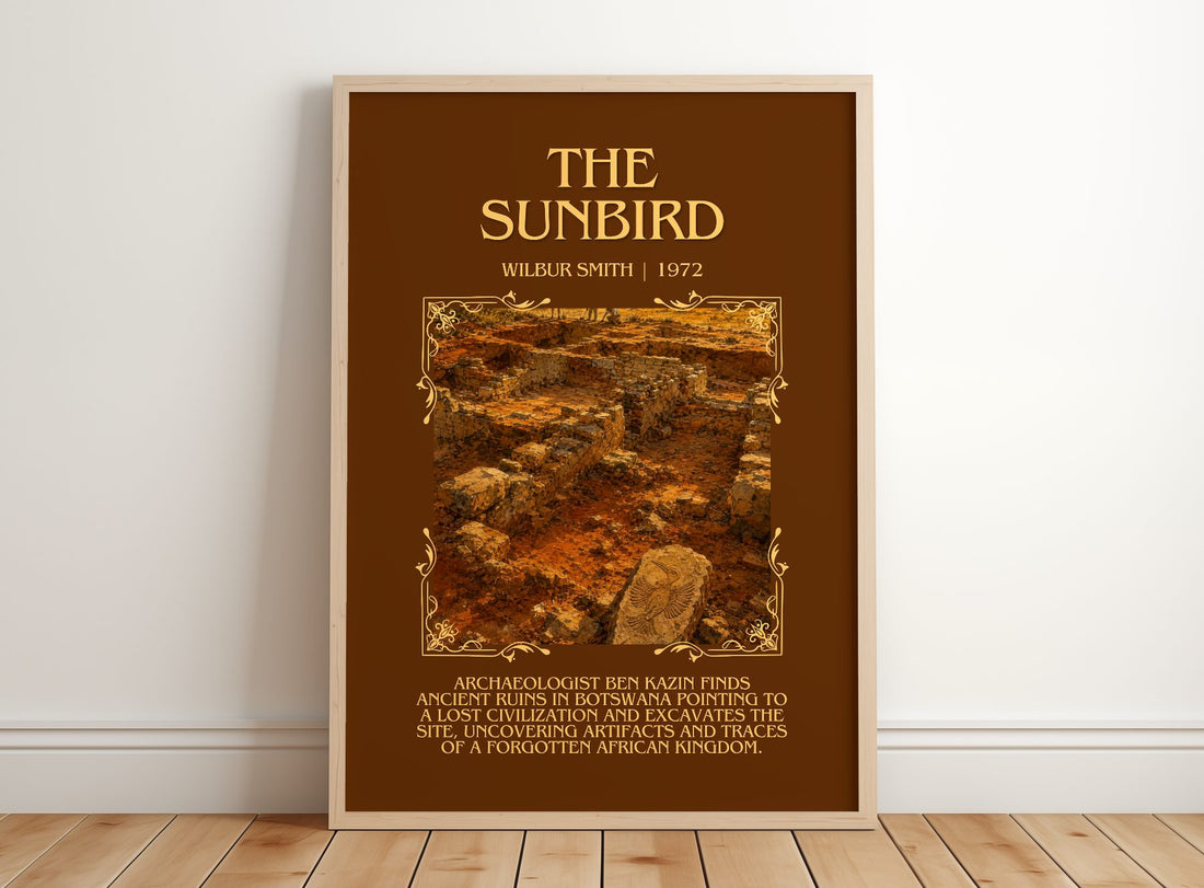 The Sunbird Minimalist Book Poster by Wilbur Smith – framed print leaning on a wooden floor