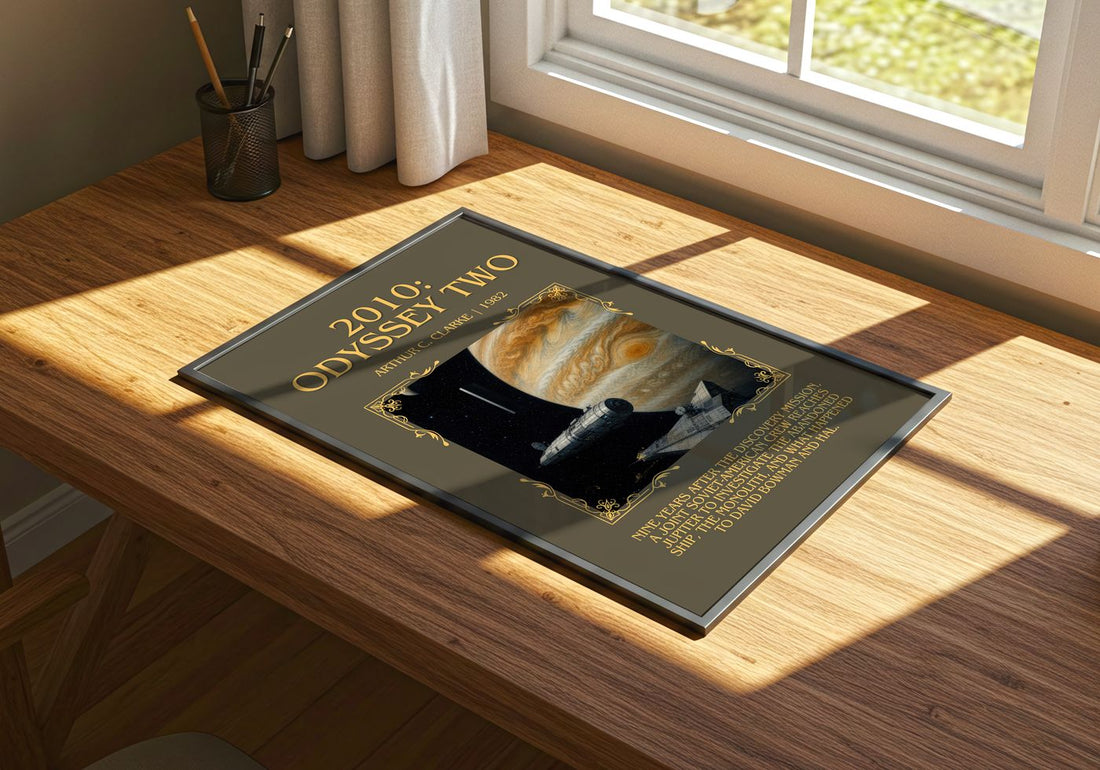 2010: Odyssey Two Minimalist Book Poster by Arthur C. Clarke – print on a sunlit desk