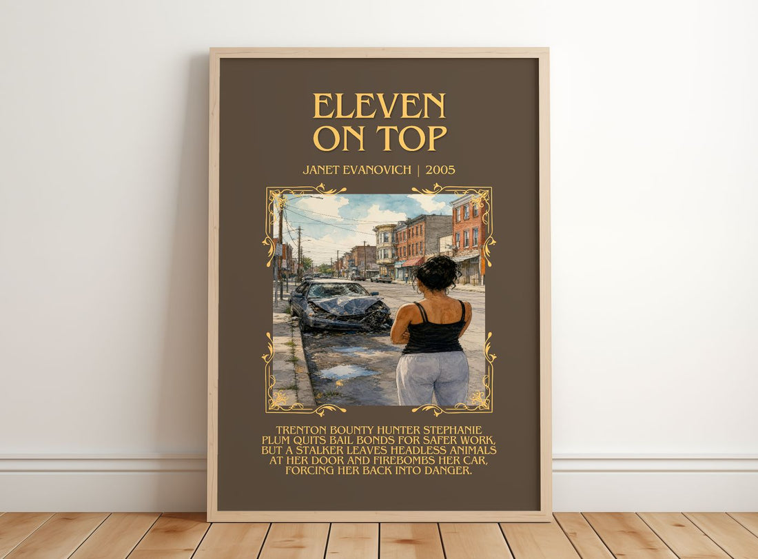 Eleven on Top Minimalist Book Poster by Janet Evanovich – framed print leaning on a wooden floor
