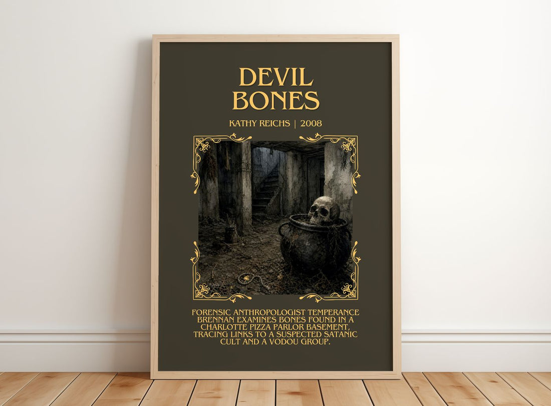 Devil Bones Minimalist Book Poster by Kathy Reichs – framed print leaning on a wooden floor