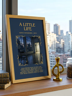 A Little Life Minimalist Book Poster by Hanya Yanagihara – framed print on a city-view windowsill