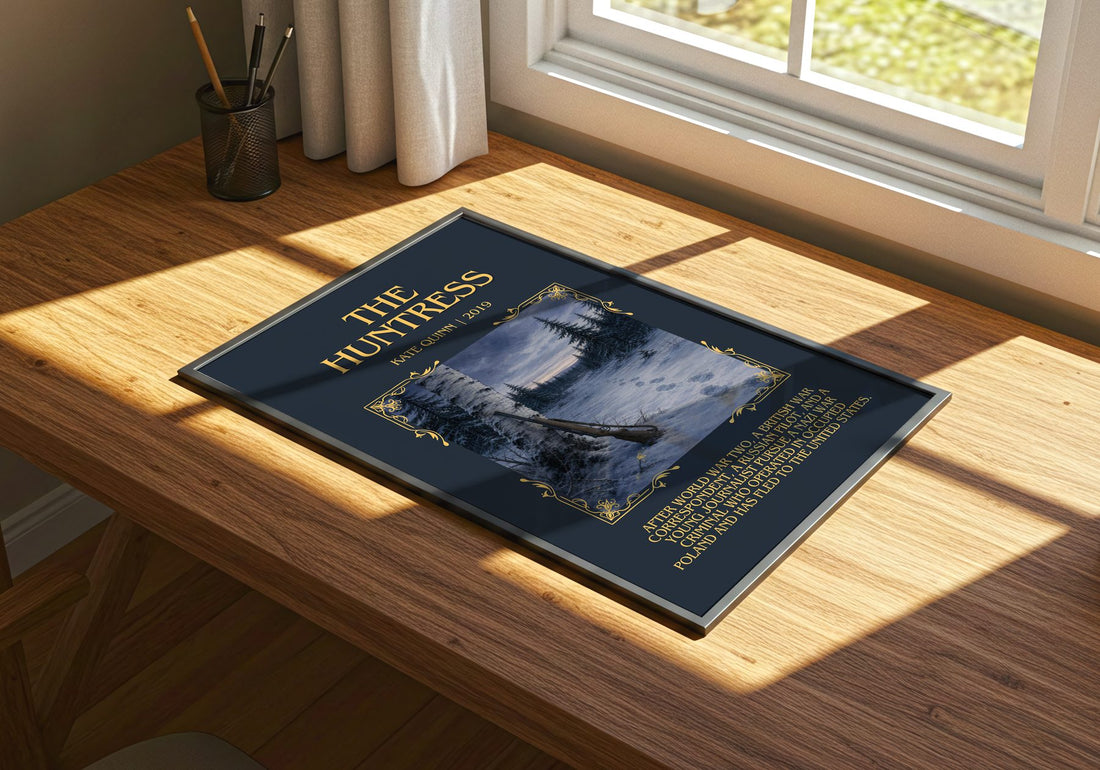 The Huntress Minimalist Book Poster by Kate Quinn – print on a sunlit desk