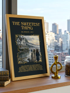 The Sweetest Thing Minimalist Book Poster by Jill Shalvis – framed print on a city-view windowsill