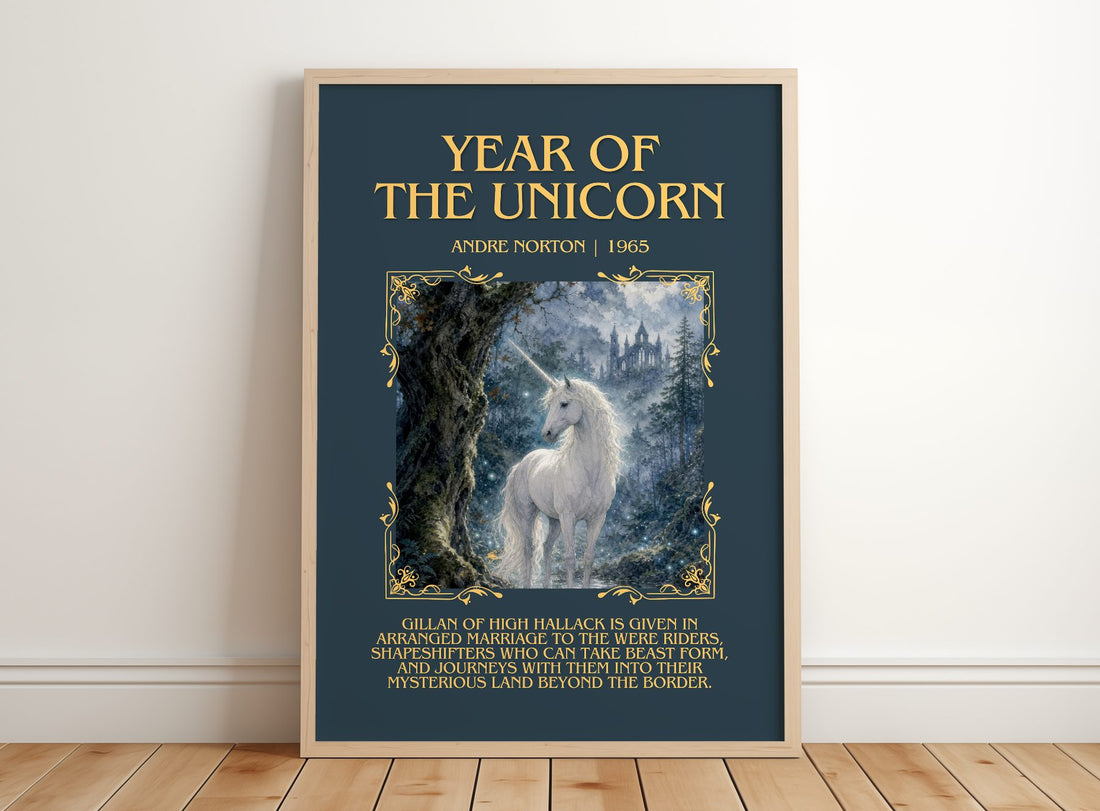 Year of the Unicorn Minimalist Book Poster by Andre Norton – framed print leaning on a wooden floor