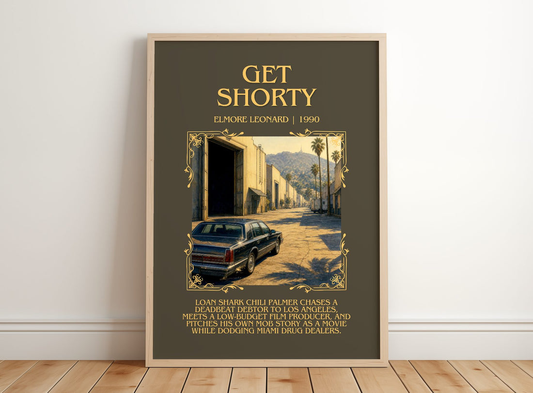 Get Shorty Minimalist Book Poster by Elmore Leonard – framed print leaning on a wooden floor