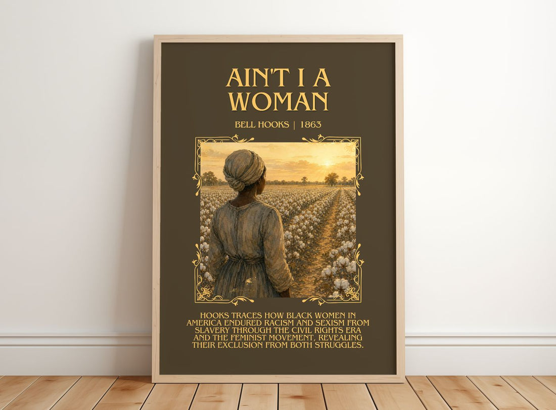 Ain't I a Woman Minimalist Book Poster by Bell Hooks – framed print leaning on a wooden floor